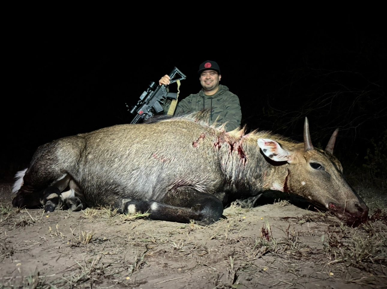 Hunter with a nilgai